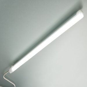 Slim linear L E D luminaire with a white finish.